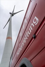 Height rescuers from the Oberhausen fire brigade practise abseiling from a wind turbine from a