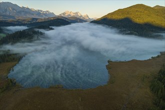 Aerial view of a mountain lake in front of mountains, sunrise, fog, autumn, Barmsee, view of