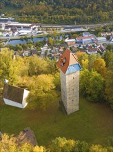 Aerial view of an old tower in autumnal landscape with village in the background, Horb, Black