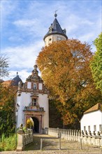 Gatehouse and keep of Wiesenburg Castle in autumn, International Art Trail, Hoher Fläming nature