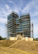 Orford Castle surrounded by scaffolding during restoration project by English Heritage, Orford,