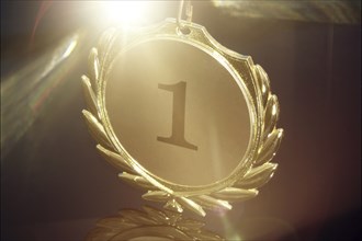 Close-up of a symbolic gold medal