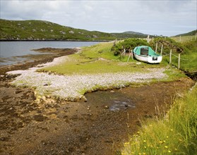 Small fishing boat on the east coast of Barra, Outer Hebrides, Scotland, UK