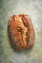 Fresh bread, sourdough, oval shape, top view, rustic style