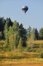 Hot air balloon over the Rothenthurm high moor in the canton of Schwyz, Switzerland, Europe