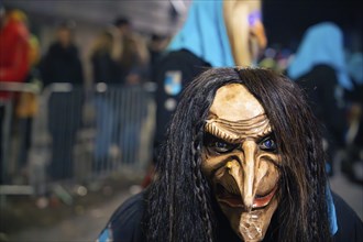 Close-up of a scary carnival mask with blur effect, carnival, Schellbronn night parade,