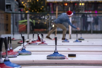 Curling rink at the Christmas market in Düsseldorf, North Rhine-Westphalia, Germany, Europe