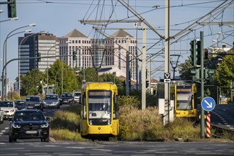 Road traffic, tram on Altendorfer Straße, in the background the town hall, left and the Weststadt