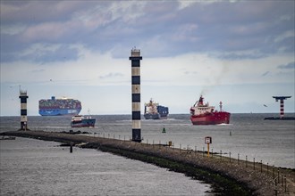 Entrance to the seaport of Rotterdam, various ships, container freighter, Cosco Shipping Aries,