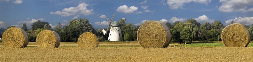 Panorama Historic windmill with straw bales Tündern Hameln Germany