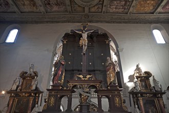 Altar above painted coffered ceiling in the Basilica of St Emmeram. Regensburg, Upper Palatinate,