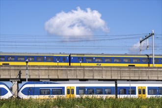 Trains of the Dutch railway, NS, Nederlandse Spoorwegen N.V., on a double-decker track, below local