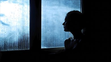 Lonely woman lost in the realm looking out of a weathered window as symbol for loneliness, AI