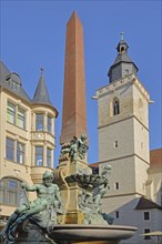 Old Anger Fountain built in 1890 with sculptures, historic building and Gothic Wigberti Church,