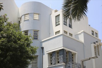 Bauhaus-style residential building on Rothschild Boulevard, part of the White City, with 4, 000