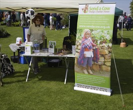 Send a Cow charity stall at garden open day, Helmingham Hall, Suffolk, England, United Kingdom,