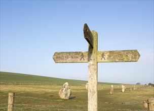 Wooden footpath signpost at the Avenue, Avebury World Heritage site, Wiltshire, England, UK