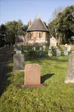 Holy Trinity Village parish church Oare, Wiltshire, England, UK built 1858 red brick Victorian