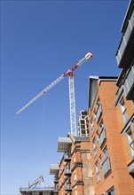 Tall crane at construction site of the 'Wine Rack' building, Waterfont, Wet Dock, Ipswich, Suffolk,