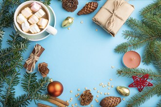 Christmas or New Year frame composition. Decorations, box, cinnamon, cones, fir and spruce