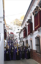 Easter Christian religious procession through streets of Setenil de las Bodegas, Cadiz province,