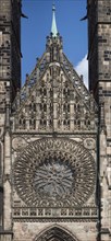 Gothic rose window with central pediment from the main portal of St SLorenz, Nuremberg, Middle