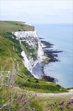 White cliffs of Dover, hiking trails, bay with shipwreck, view of the chalk cliffs and the sea with