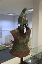 Helmet and armour of a Thracian soldier on display in Kazanlak museum, Bulgaria, eastern Europe,