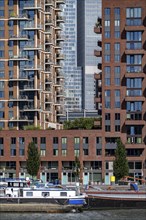 Harbour basin of the Maashaven, inland waterway port, jetties, residential buildings in the Kop van