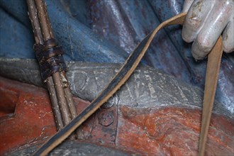 Inscription on the hem of Christ's cloak, detail of the palm tree, wooden figure from around 1470,