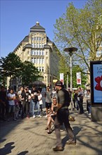 Germany, Hamburg, City, View to Spitalerstraße, Shops, Street cafe, Main shopping street, Magician