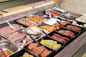 Variety of fine meat products in the butchery (Variety of fine meat products in the butchery)