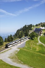 View of Mount Rigi with Rigi railway with Alps mountains in Rigi, Switzerland, Europe