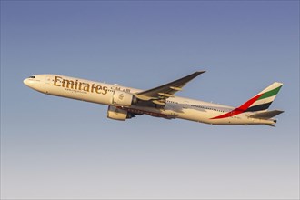 An Emirates Boeing 777-300ER aircraft with the registration A6-ECJ at the airport in Dubai, United