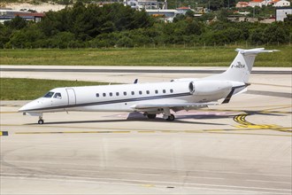 An Embraer 505 Phenom 300 aircraft of VallJet with the registration number F-HGSA at Split Airport,