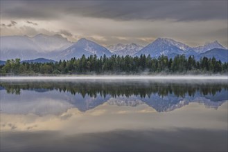 Sunrise, Lake Hopfensee, near Füssen, Ostallgäu, with the Tannheim Mountains behind, Allgäu,