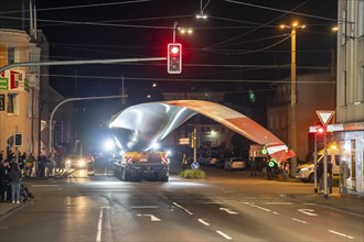 Transport of a 68 metre long, 22 tonne blade of a wind turbine, here in Schwelm, with a