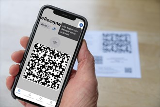 Symbolic image of an e-prescription, prescription issued by a doctor, with QR code, is scanned