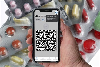 Symbolic image of an e-prescription, prescription issued by a doctor, with QR code, is scanned