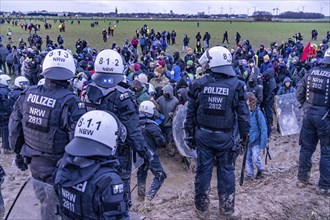 Violent clashes between thousands of demonstrators and the police, after a demonstration against