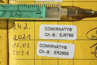 Vaccination booklet, proof of double vaccination with the Corona vaccine from BioNTEch/Pfizer,