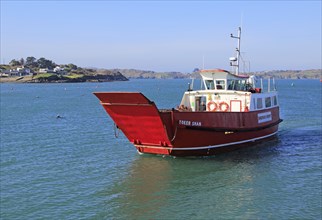 Ferry boat leaving harbour for Sherkin Island, Baltimore, County Cork, Ireland, Irish Republic view