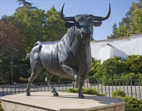 Sculpture of bull with horns near the bullring in Ronda, Spain, Europe