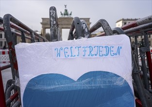 Demonstration, posters and barriers at the Brandenburg Gate, Berlin, Germany, Europe