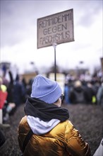 150, 000 people gather around the Bundestag in Berlin to build a human wall against the shift to