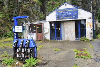 Closed filling station garage, Blaenau Ffestiniog, Gwynedd, north Wales, UK