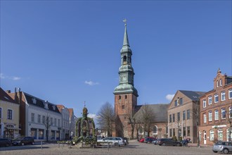 Market square with Easter fountain and St Laurentius Church, Tönning, North Friesland,