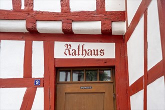 Entrance to the town hall, in the four-gabled house, Monreal, idyllic half-timbered town in the Elz