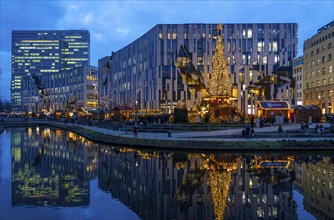 Christmas market, at the Kö-Bogen shopping centre, in the city centre of Düsseldorf, at the back