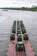 Rhine Ro-ro Service BV, vehicle freighter Dynamica, transports straight tractors, tractors, cargo